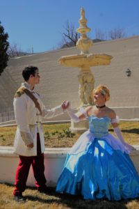 charming talks to Cinderella by th fountain